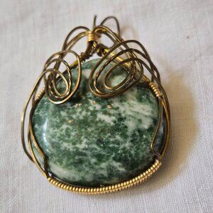 TURQUOISE PENDANT WRAPPED IN SILVER WIRE